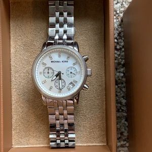 Michael Kors watch. Needs new battery.